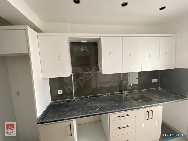 Kuşadası Davutlar Merkezde Satılık Sıfır 1+1 Daire - Görsel 12