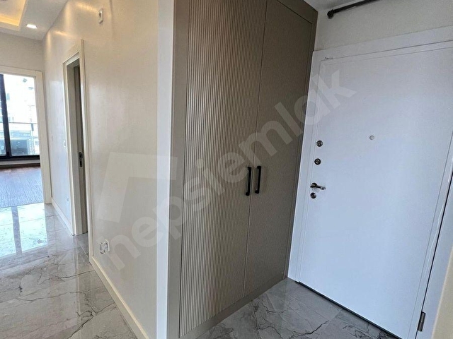 KALAMIŞTA DENİZ MANZARALI SIFIR BİNADA NET 105 M2 SATILIK - Görsel 13