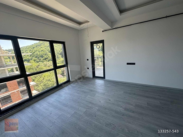 REELDEN ANAYOLA SAHİLE YAKIN HOLLÜ SIFIR SATILIK 1+1 DAİRE - Görsel 4