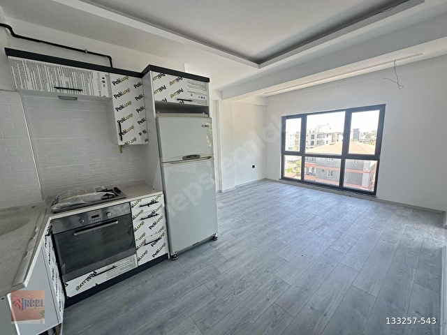 REELDEN ANAYOLA SAHİLE YAKIN HOLLÜ SIFIR SATILIK 1+1 DAİRE - Görsel 2