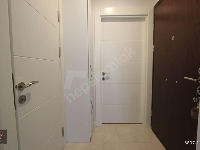 BAHÇELİEVLER TANSUDAN 1. CADDE ÜZERİNDE. BAHÇE KATI 1+1 FULL MOBİLYALI KAPALI OTO PARKLI YENİ DAİRE - Görsel 15