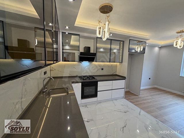 SOYLU GAYRİMENKULDEN SOKULLU CADDE ÜZERİNDE 3+1 1.KAT EBEVEYN BANYOLU FULL YAPILI SATILIK DAİRE
