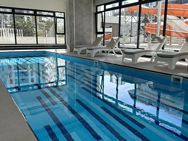 ALANYA MAHMUTLARDA OTEL KONSEPTLİ SİTEDE FULL EŞYALI 2+1 SATILIK DAİRE - Görsel 16