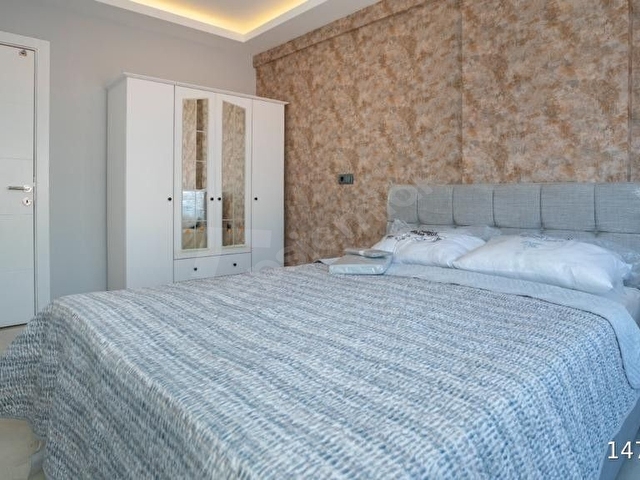 ALANYADA MERKEZDE MÜKEMMEL KONUMDA YÜKSEK KİRA GETİRİLİ SATILIK YENİ DAİRE - Görsel 9