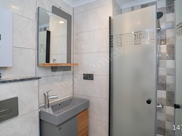 ALANYADA MERKEZDE MÜKEMMEL KONUMDA YÜKSEK KİRA GETİRİLİ SATILIK YENİ DAİRE - Görsel 10