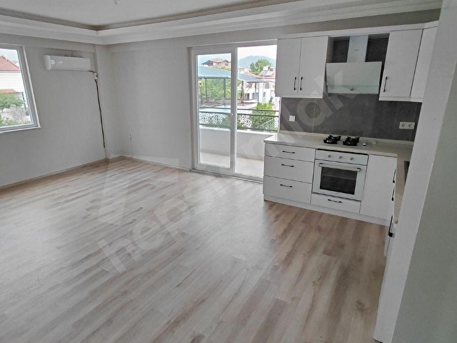DALAMANDA HAVUZLU SİTE İÇERİSİNDE SATILIK 2+1 DAİRE