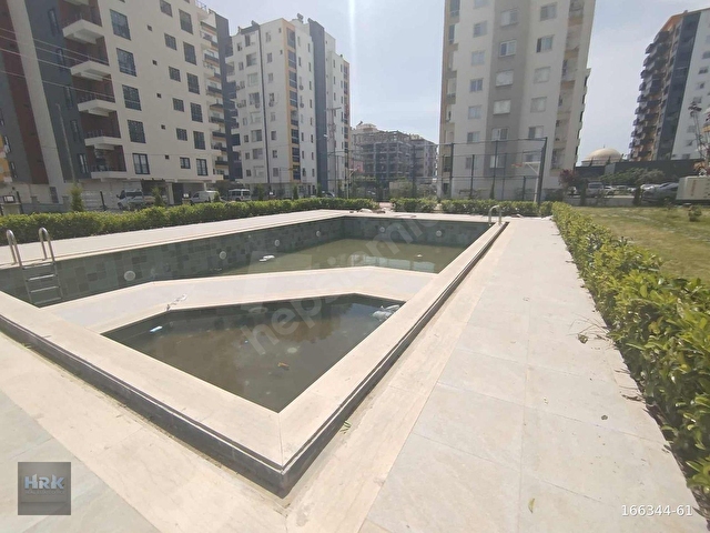 HRKDEN ERDEMLİ AKDENİZ MAHDE 1+1 HAVUZLU SATILIK DAİRE