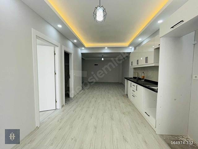 Milas Gümüşlükte Satılık 1+1 Daire Harmaya Real Estate