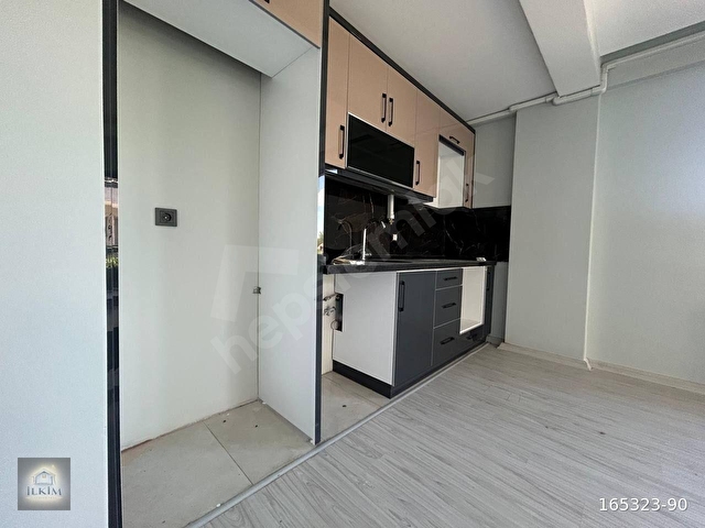 BURHANİYE BAHÇELİEVLERDE GENİŞ BAHÇELİ 1+1 SATILIK DAİRE - Görsel 2