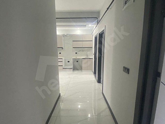 KEY HOUSETAN  DEĞİRMENALTINDA DENİZ MANZARALI HAVUZLU SİTEDE SIFIR LUX 2+0DAİRE - Görsel 6