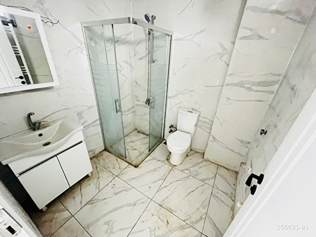 GÖMEÇ ÇARŞI MERKEZİNDE HARİKA KONUMDA ÖN CEPHE 2+1 DAİRE - Görsel 27
