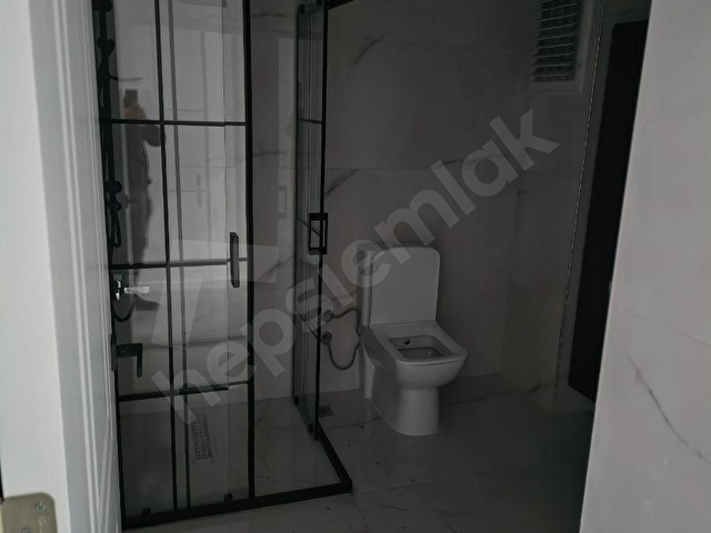 Muradiyede satılık yerden ısıtmalı 2+1 açık mutfak daire - Görsel 14