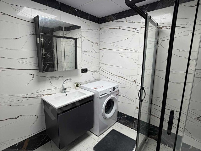 KÖRFEZDE ÖZENLE DİZAYN EDİLMİŞ FUL EŞYALI SATILIK LÜKS 1+1 DAİRE - Görsel 17