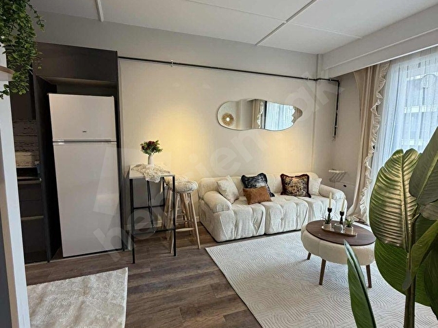 KÖRFEZDE ÖZENLE DİZAYN EDİLMİŞ FUL EŞYALI SATILIK LÜKS 1+1 DAİRE