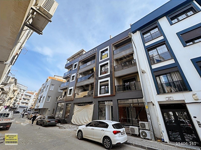 SEFERİHİSAR ÇARŞI MERKEZİNDE 65m2 AÇIK MUTFAK ZEMİN ÜSTÜ 2+1