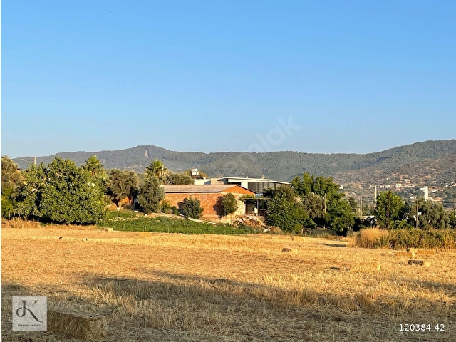 Muğla Bodrum yol üzerinde satılık yatırımlık tarla