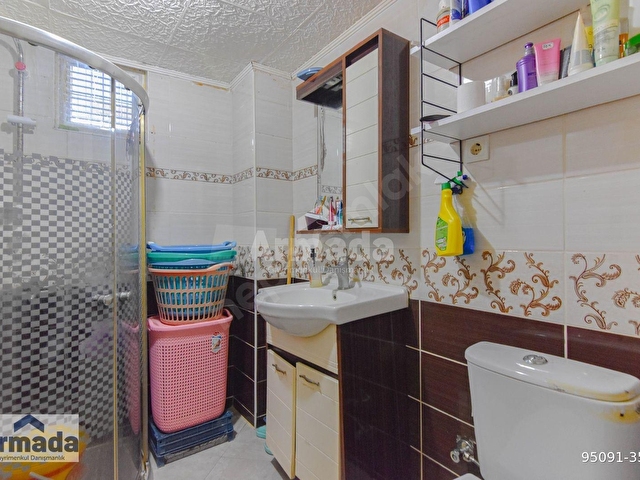 KUŞADASI MERKEZDE GENİŞ BAHÇELİ 3+1 GİRİŞ KATI DAİRE - Görsel 12