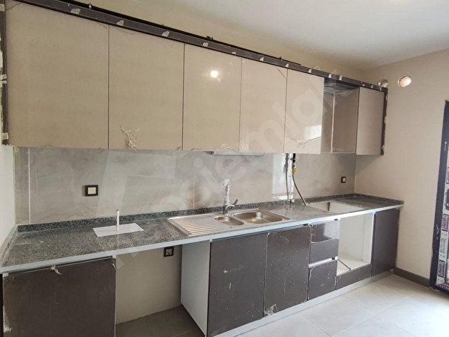 MÜNEVVER ÇELENK GAYRİMENKUL KUZUCULU TOKİ KİRALIK 3+1 DAİRE