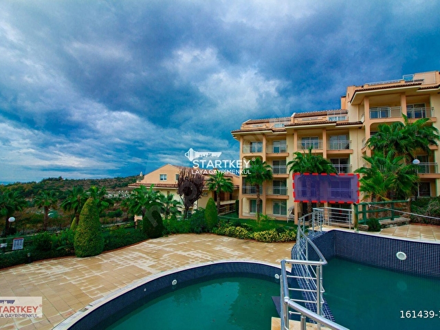 KUŞADASI GOLF RESORTTA DENİZ MANZARALI EŞYALI SATILIK 2+1 DAİRE