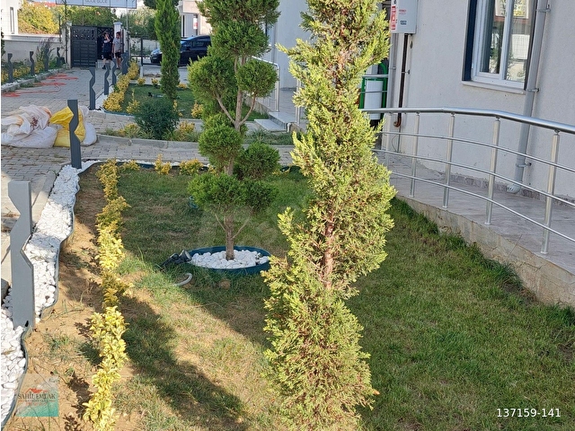 SAHİL EMLAKTAN SATILIK  BAHÇELİ 1+1 SIFIR DAİRE