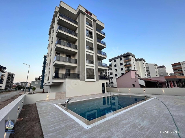 KUM MAHALLESİNDE SATILIK HAVUZLU 1+1 DAİRELER