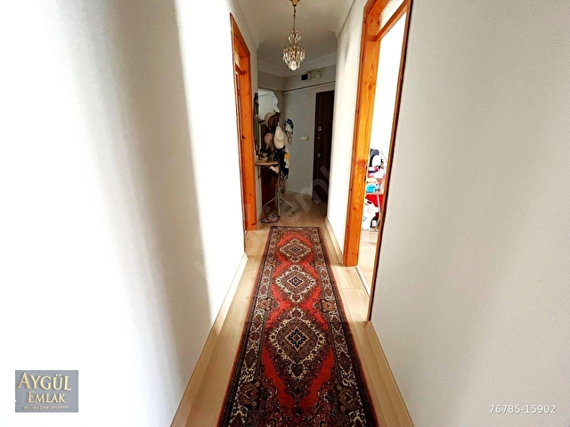 AYGÜLDEN AKÇAYDA MERKEZİ KONUMDA CAM BALKONLU AYRI MUTFAKLI DENİZE YAKIN ARA KAT 3+1 SATILIK DAİRE - Görsel 18