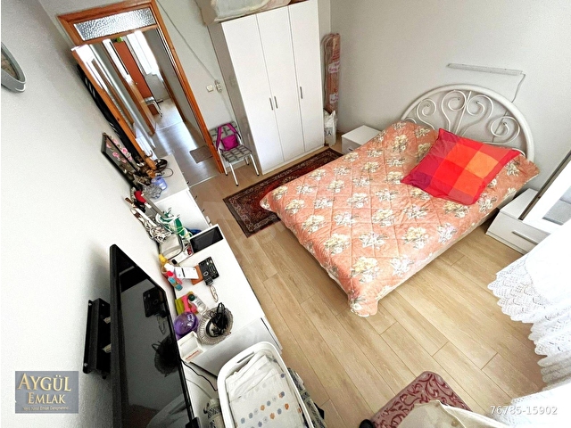 AYGÜLDEN AKÇAYDA MERKEZİ KONUMDA CAM BALKONLU AYRI MUTFAKLI DENİZE YAKIN ARA KAT 3+1 SATILIK DAİRE - Görsel 20
