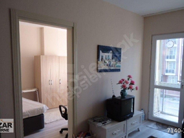 HIZLITREN GARI KARŞISI,MERKEZİ KONUMDA,HER YERE ÇOK YAKIN,FULL EŞYALI,BALKONLU 1+1 SATILIK DAİRE