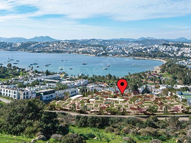 Bodrum Eskiçeşmede Yatırımlık,Deniz Manzaralı,Plajlı Sitede Eşysız Bahçe Katı 2+1 Satılık Yeni Daire