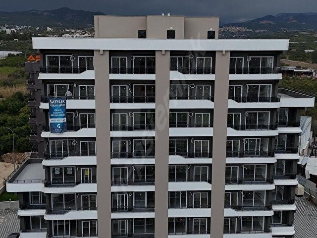 MEZİTLİ KİRALIK ANAYOLA YAKIN GENİŞ PEYZAJLI SIFIR 1+1 DAİRE - Görsel 14