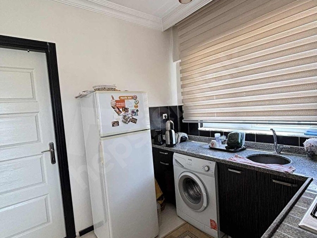 ONKOLOJİ BÖLGESİ HAVUZLU SİTEDE İSKANLI SATILIK 1+1 EŞYALI DAİRE - Görsel 10
