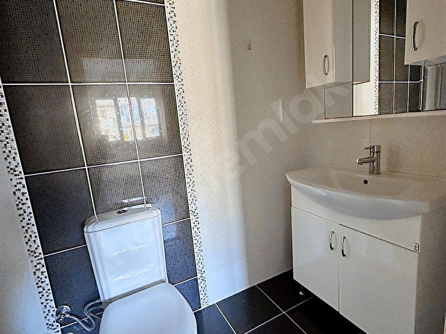 Kuşadası Şahan Sitesinde 3+1 Geniş ve Doğalgazlı Daire - Görsel 17