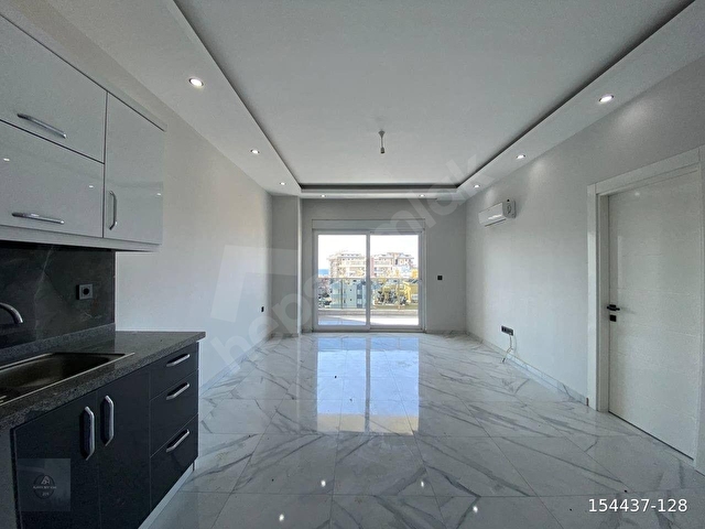 MAHMUTLARDA FULL AKTİVİTELİ SİTEDE 1+1 60 m2 7.KAT GÜNEY CEPHE - Görsel 10