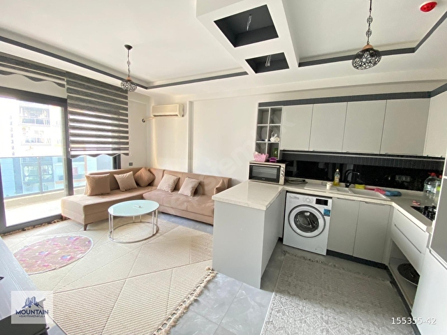 TÖMÜKTE DENİZ MANZARALI EŞYALI SATILIK 1+1 LÜX DAİRE