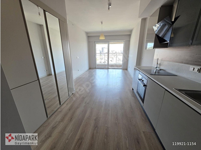 NİDAPARK GAYRİMENKULDEN SEDEF ETABINDA BÜYÜK TİP KİRALIK 1+1