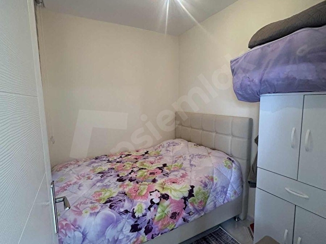 Davutlar merkezde geniş site içinde satılık daire - Görsel 19