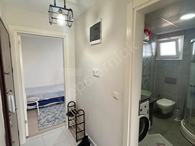 SIĞACIK MERKEZDE ZEMİN ÜSTÜ ARA KAT DOĞA MANZARALI EŞYALI 1+1 - Görsel 24