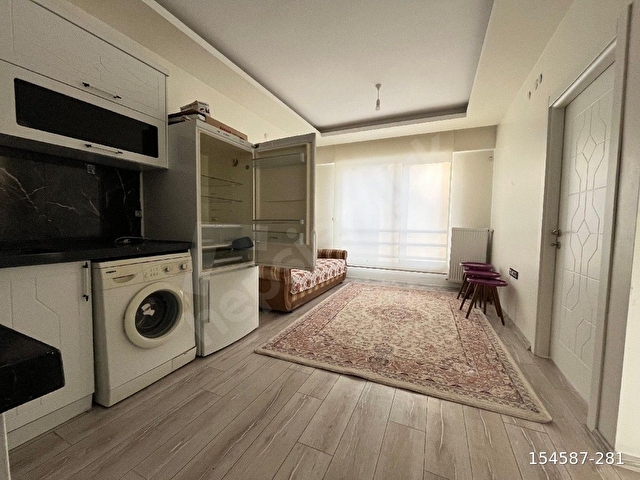 PAPATYA CADDESİNDE TEMİZ 1+1 EŞYALI KİRALIK DAİRE