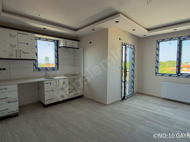 NO:10 GAYRİMENKUL’DEN MERKEZİ KONUMDA MÜSTAKİL TADINDA 1+1 AİDATSIZ FIRSAT DAİRE - Görsel 2