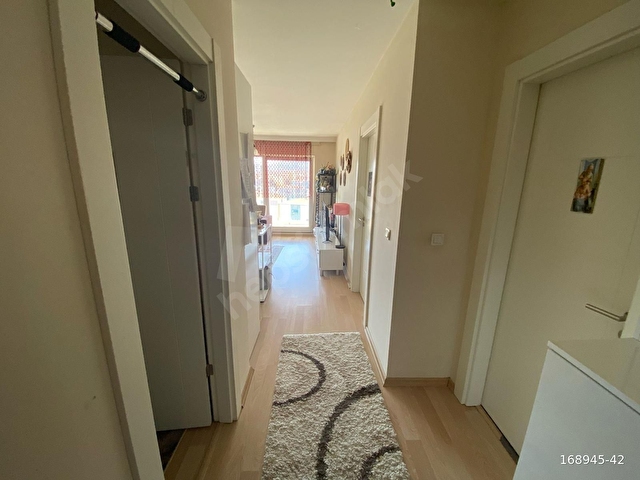BLUE PLANET SİTESİ HAVUZ CEPHE BALKONLU 1+1,5 DAİRE EŞYALI - Görsel 2