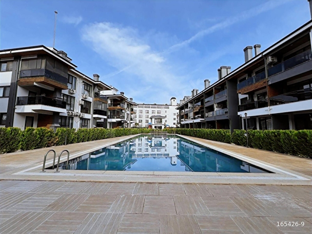 DALAMANDA HAVUZLU ULTRA LÜKS SİTEDE EŞYALI KİRALIK 2+1 DAİRE