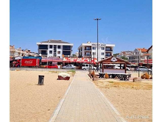 Ayvalık Sarımsaklıda denize sıfır yeni binada full eşyalı daire - Görsel 2