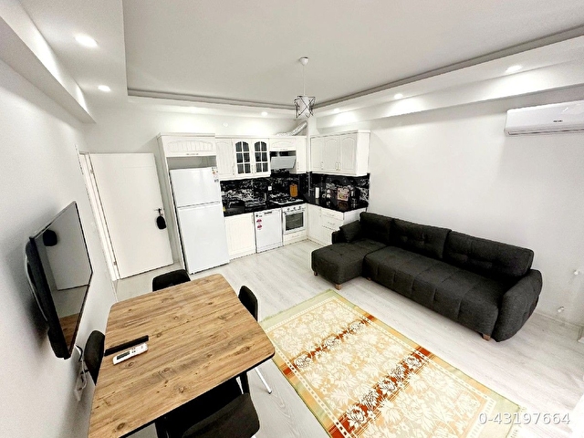 Ayvalık Sarımsaklıda denize sıfır yeni binada full eşyalı daire - Görsel 8