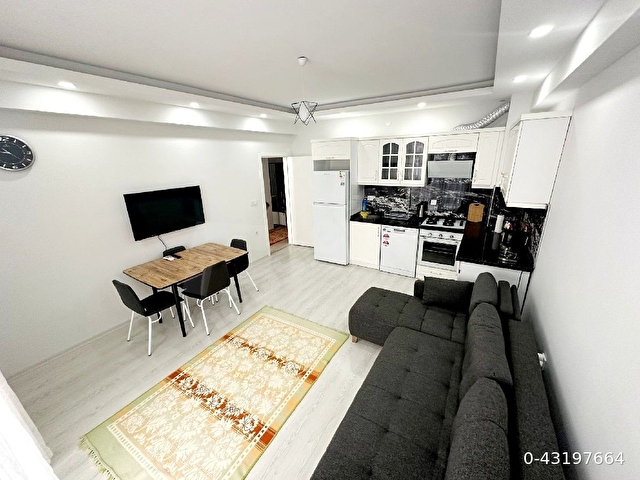 Ayvalık Sarımsaklıda denize sıfır yeni binada full eşyalı daire - Görsel 11