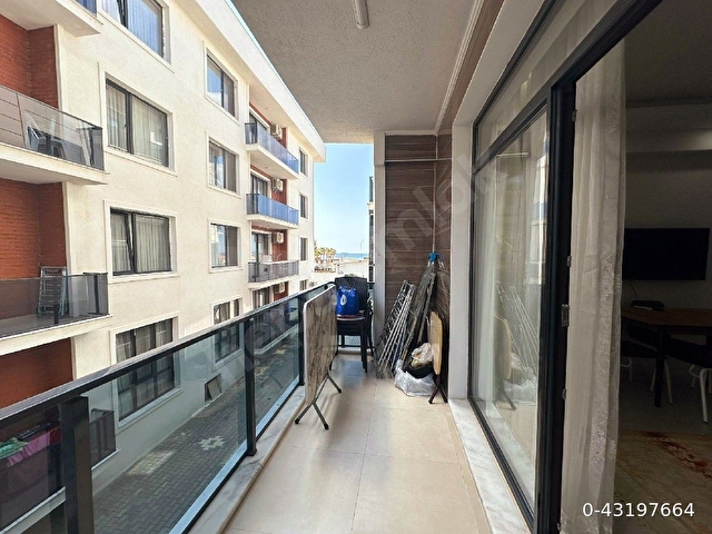 Ayvalık Sarımsaklıda denize sıfır yeni binada full eşyalı daire - Görsel 13