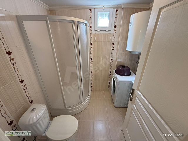 KUŞADASINDA MERKEZE YAKIN DENİZ MANZARALI 3+1 YOLA CEPHELİ DAİRE - Görsel 25