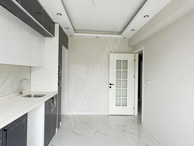 ERGENEKONDA BİLGİKENT OKULUNA YAKIN SATILIK 2 + 1 DAIRE