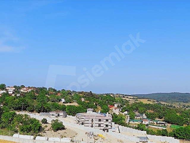 ARNAVUTKÖY BALABAN KÖYÜNDE ORMAN MANZARALI ÖNÜ AÇIK TARLA