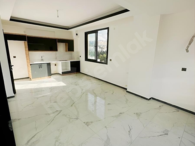 KUŞADASI ALACAMESCİT MAHALLESİNDE SATILIK 1+1 60 M2 YENİ DAİRE. - Görsel 5