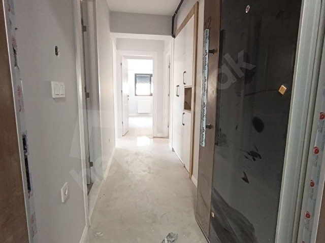 ALSANCAKTA SIFIR İNŞAAT 1.KAT 2 BANYOLU OTOPARKLI SATILIK DAİRE - Görsel 24